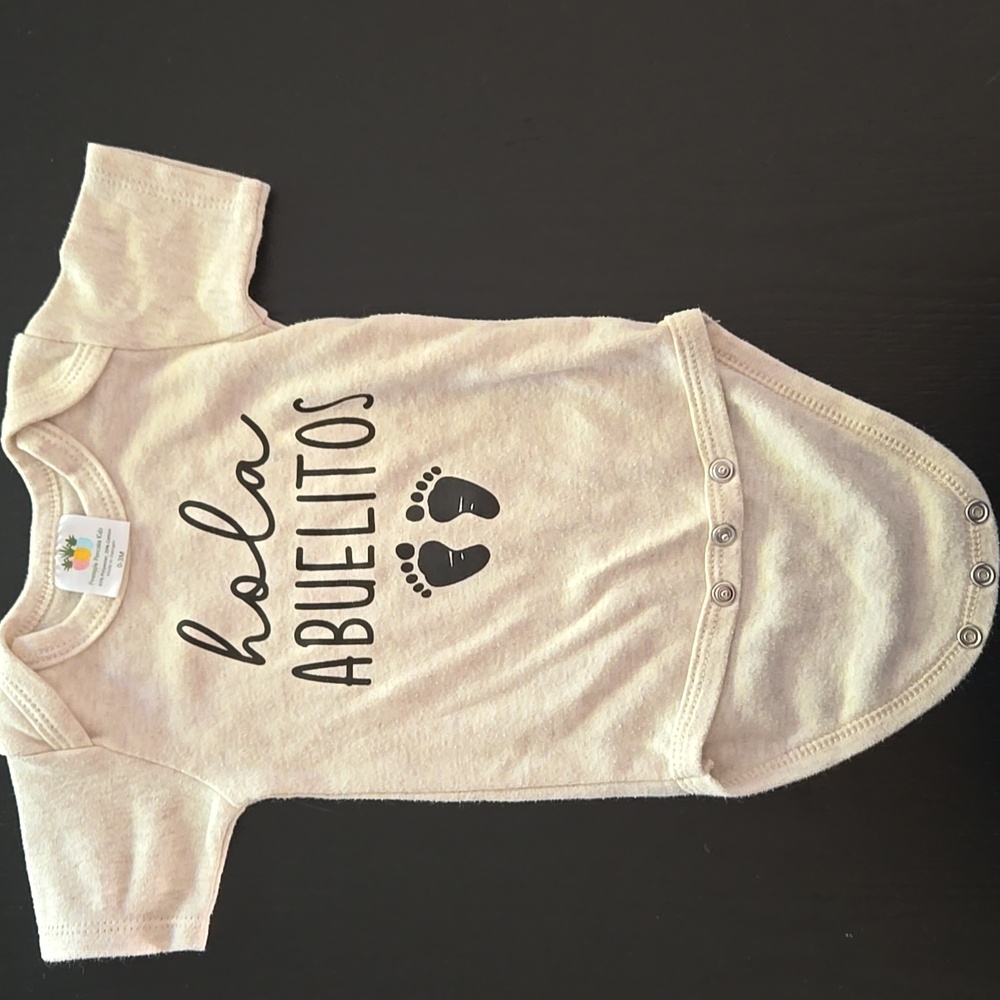 Cream Baby Onesie with 'Hola Abuelitos' Print
